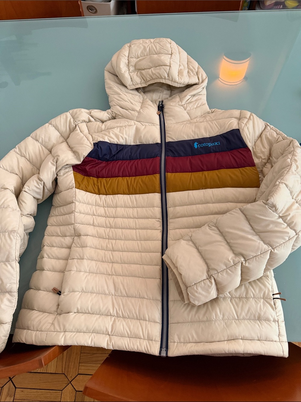 Cotopaxi Cream Hooded Puffer with Navy, Burgundy & Mustard Stripes